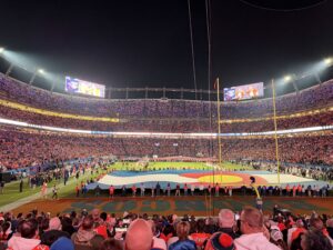 Mile High Stadium, with the Colorado flag drapped over the field